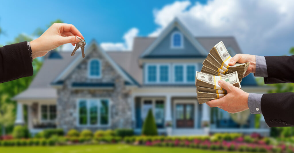 Real Estate Agent Handing Over House Keys for Stacks of Money in Front of New House.